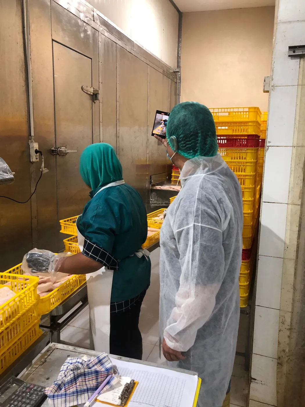 Staff conducting a quality control check